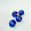 Set de 4 abalorios de cristal de Murano azul claro brillante